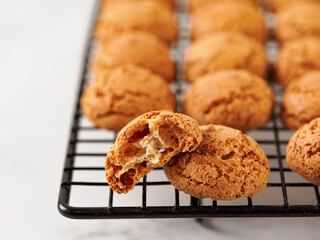 Amaretti cookie on cooling rack - traditional Italian Sardinian pastry. Delicious amaretti biscuit...
