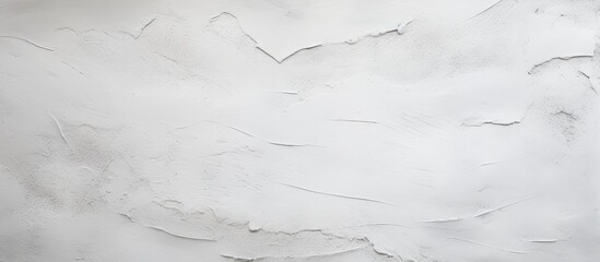 An upclose view of a white wall resembling a landscape covered in snow and ice, with intricate...