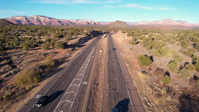 Drone Shot of Traffic on State Route in Arizona USA, Cars, Landscape and Cracked Asphalt
