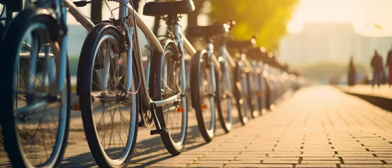 Foto op Plexiglas Closeup of bicycles parking beside the walkway  © Mishi