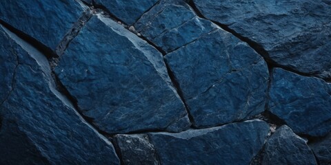 Rock texture background. dark blue rough mountain surface. textured stone background with space for design