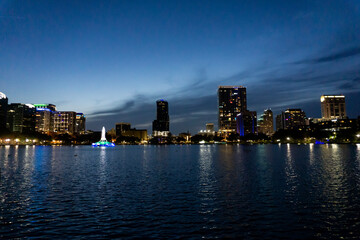 Fototapeta na wymiar Orlando City skyline at night Lake Eola