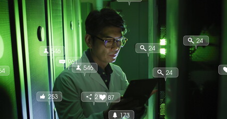 Image of falling icons over biracial male server room worker