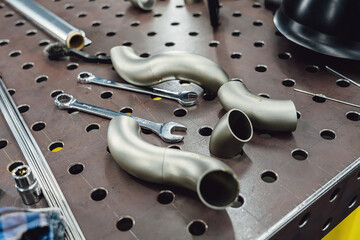 Welded production of external wastegate manifold from stainless steel, exhaust manifolds in a...