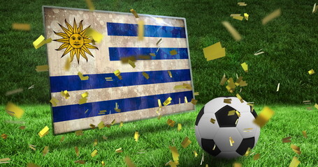 Image of confetti and flag of uruguay over football and stadium