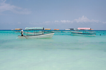 Nungwi Beach and boats on the Indian Ocean waiting for tourists, Zanzibar near Jambiani