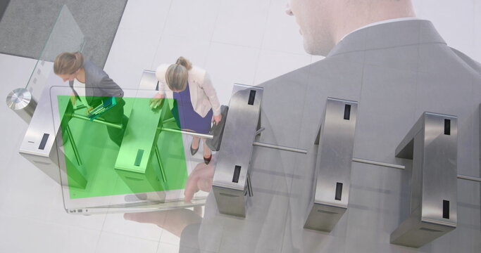 Image of businessman using laptop with green screen over women walking through turnstiles - Powered by Adobe