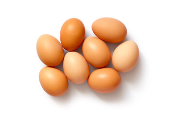 Natural homemade chicken eggs. Several eggs on a white background. Top view. With a shadow.