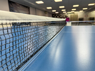 Net on a blue tennis table - 756981189