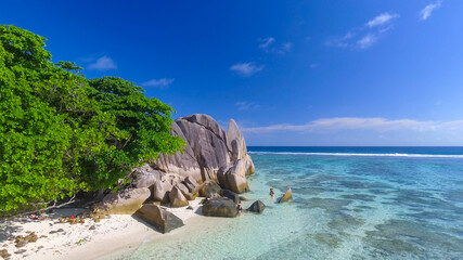 Anse Source D'Argent Beach in La Digue, Seychelles. Aerial view of tropical coastline on a sunny day - 756981705