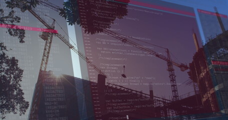 Image of interface display with scrolling information text over cranes at city construction site