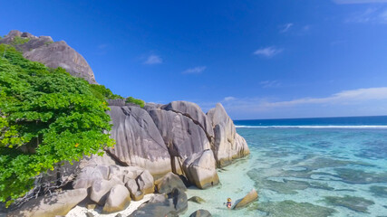 Anse Source D'Argent Beach in La Digue, Seychelles. Aerial view of tropical coastline on a sunny day - 756983154
