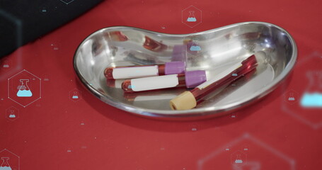 Image of network of medical icons and test tubes with blood