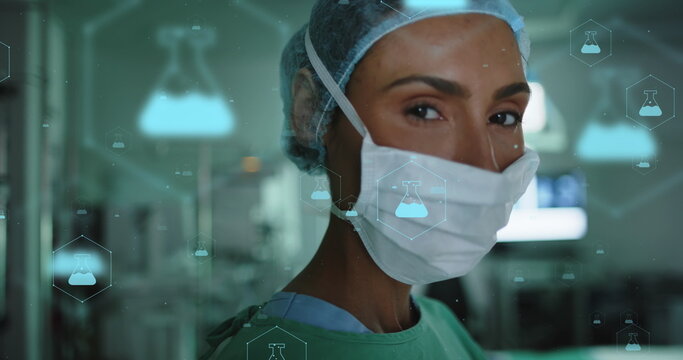 Image of network of medical icons and data processing over african american female doctor