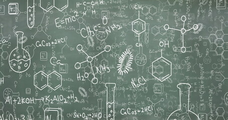 Image of mathematical and scientific drawings and formulae on blackboard