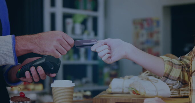 Image of network security padlock over people using payment terminal