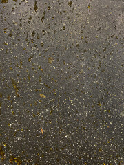 metal surface with droplets of fat