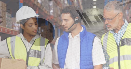 Close up of a Caucasian warehouse manager discussing with his Caucasian workers in the warehouse