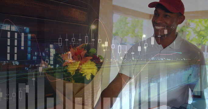 Front view of an African-american deliveryman delivering flowers