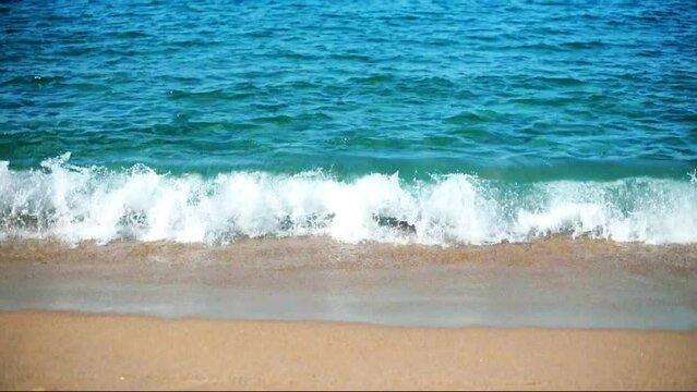 Sea surf on the beach in Catalonia