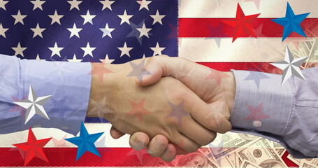 Image of business people shaking hands over american flag