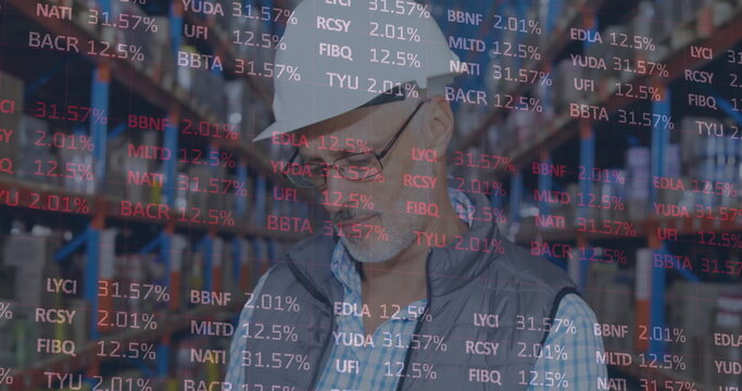 Image of financial data processing over man working in warehouse