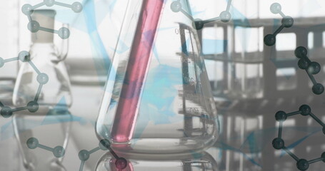 Image of molecules over laboratory dishes on grey background