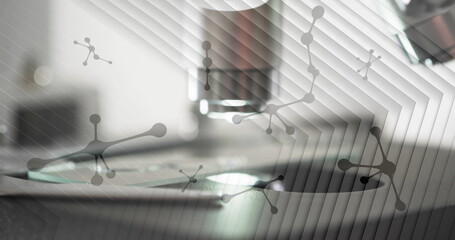 Image of molecules over laboratory microscope on white background