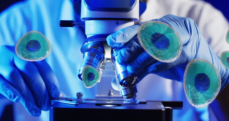 Image of white blood cells over scientist using laboratory microscope on blue background