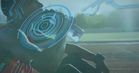 Image of digital data processing over disabled male athlete with running blades on running track