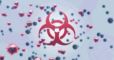 Image of biohazard sign and covid 19 cells floating over white background