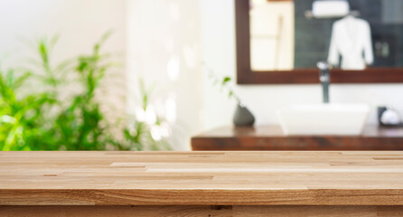 Wooden counter table top on blurred tropical resort bath room background