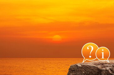 Question mark and information chat icon on rock mountain over sunset sky and sea, Technology...