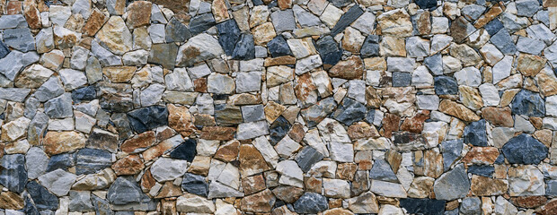 Stone wall, stacked stone fence background  - 757037740