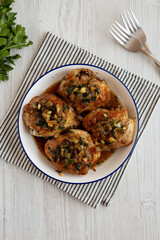 Homemade Garlic Brown Sugar Chicken in a Pan, top view. Overhead, from above, flat lay.