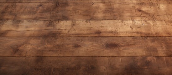 A closeup shot of a brown hardwood plank flooring with a wood stain, showcasing a beautiful beige rectangle pattern with a blurred background