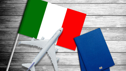 Toy airplane placed on the national flag of Italy.