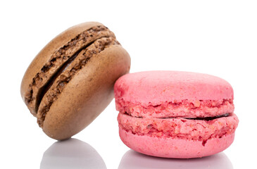 Two sweet macarons, macro, isolated on white background.