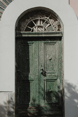 Old vintage wooden door. Travel concept. Traditional European old town building. Old historic...