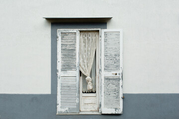 Old colourful window with shutters in Italy. Traditional European, Italian architecture. Summer...