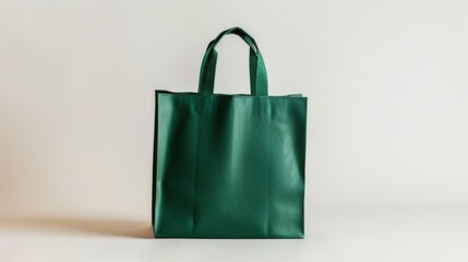 Green shopping bag on a white background. Empty shopping packet mockup