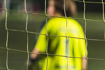 Detail of football goal white net of ropes. close up of a soccer or hockey net shallow depth of...