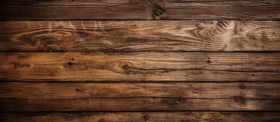 A closeup shot of a brown hardwood plank wall, showcasing the natural beauty of the wood grain. The...