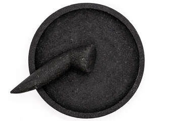 Unique traditional mortar and pestle, stone craft made for mashing seasoning purpose, Cobek and Munthu or Ulekan. Isolated on white background with copy space. Top view or flatlay.