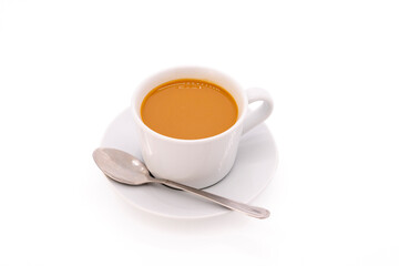 Creamy coffee on a white porcelain cup, isolated on white background with copy space.