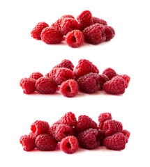Raspberries on a white background. Raspberries in close-up. Vegetarianism or healthy eating. Juicy and delicious raspberries. Raspberry background. Background of red berries. Red raspberries.