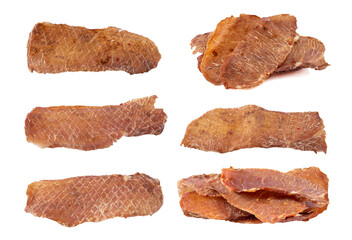 Pieces of cured pork isolated on white background. Portion of dried pork on white background. Dried pork isolated on white background. Pieces of dry meat.