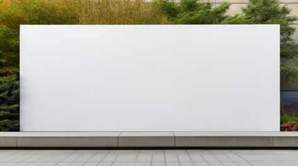 Empty horizontal billboard for advertisement on white building wall with copy space