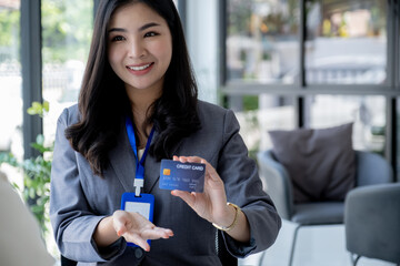 Employees present with mock up credit card payments to business customers. Ready to provide...