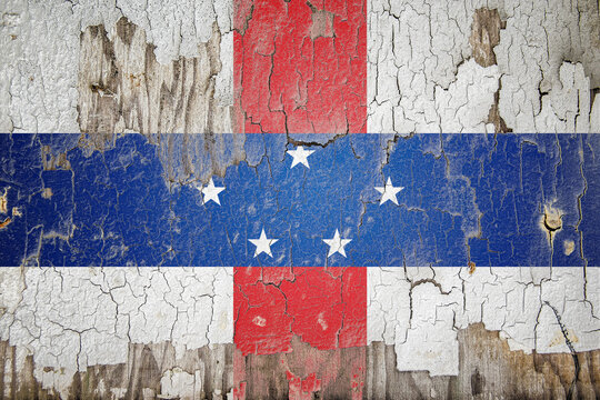 Netherlands Antilles flag painted on the cracked wall